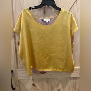 Jennifer Lopez two tone/two feels/fabrics top